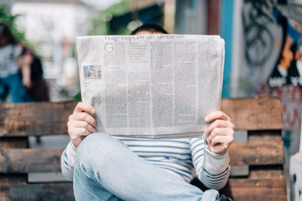 reading a newspaper